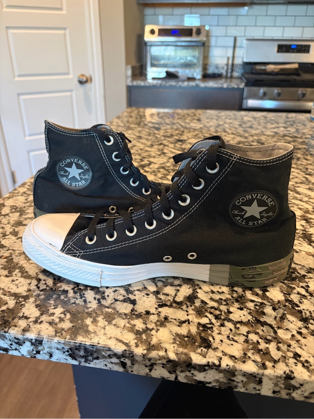 Converse Black High Top All Star Sneakers